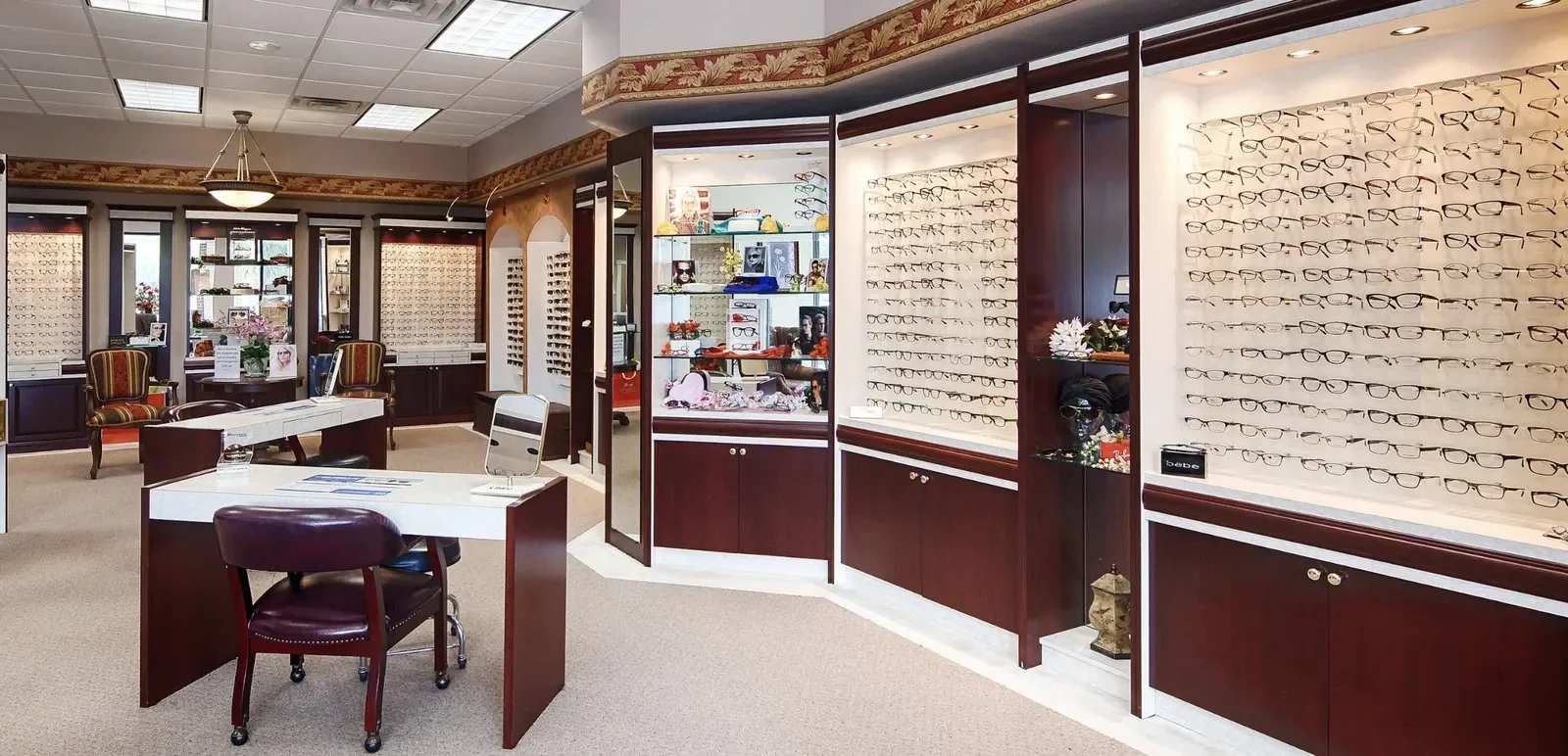 The Eye Trends optical showroom in Clear Lake, with eyeglass frames on the wall displays
