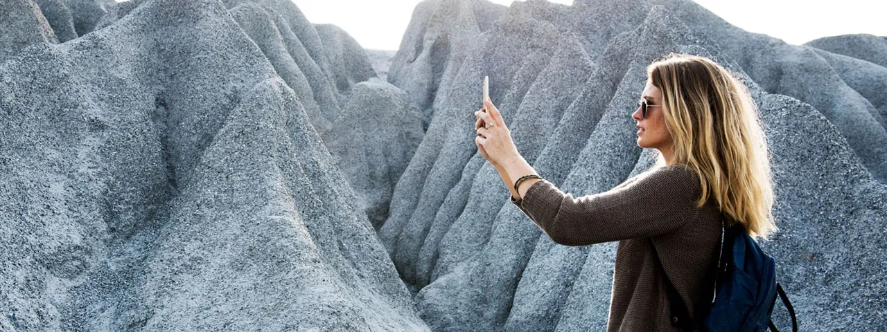 Woman-Mountains-Taking-Picture-1280x480