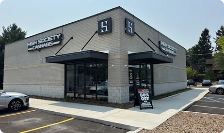 High Society Cannabis storefront with H logo signs above the entrance
