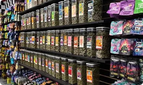 Jars of cannabis flower lined up on store shelves