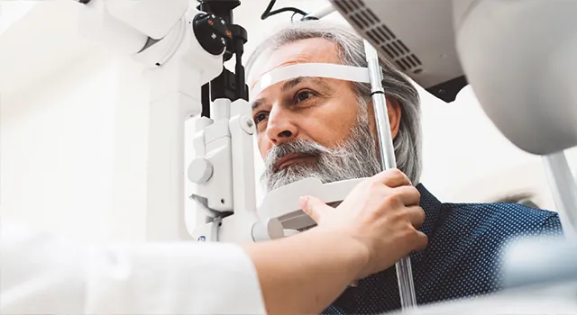old man undergoing an eye exam