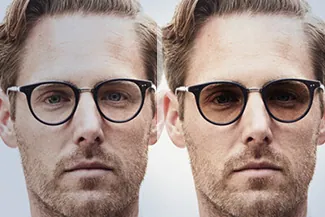 Man wearing two different styles of eyeglasses side by side